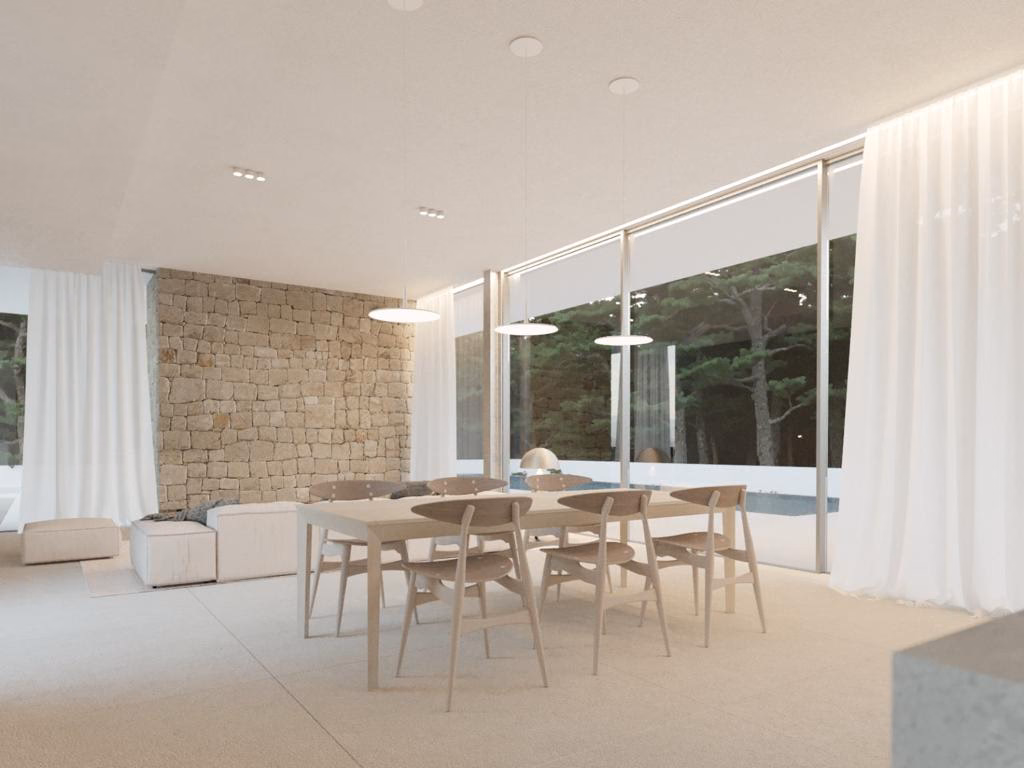 Dining area with full-height glazing onto the terrace and pines