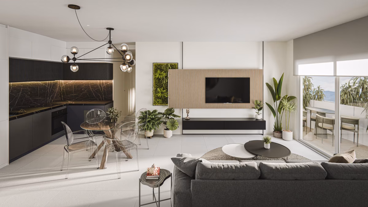 Wohnzimmer mit offener Küche, Glasesstisch und Sofa