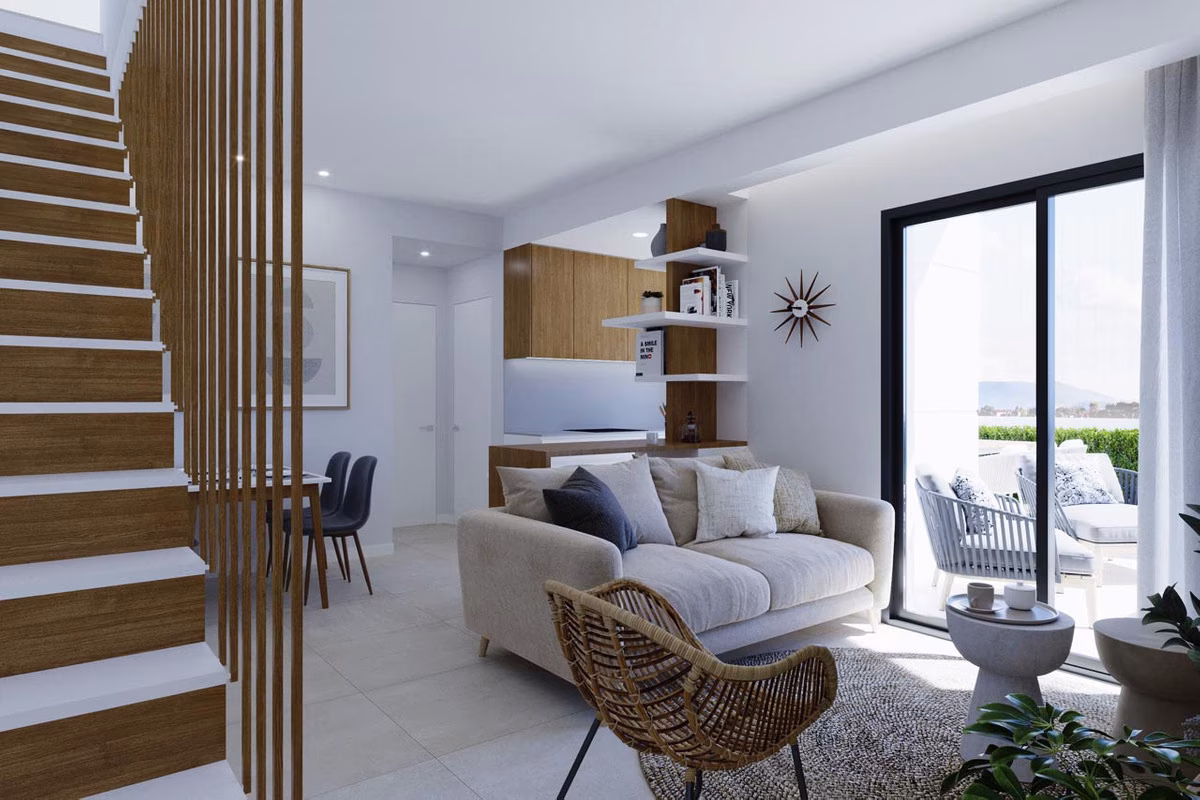 Salón con escalera de listones de madera y puertas acristaladas a la terraza en Nature Views