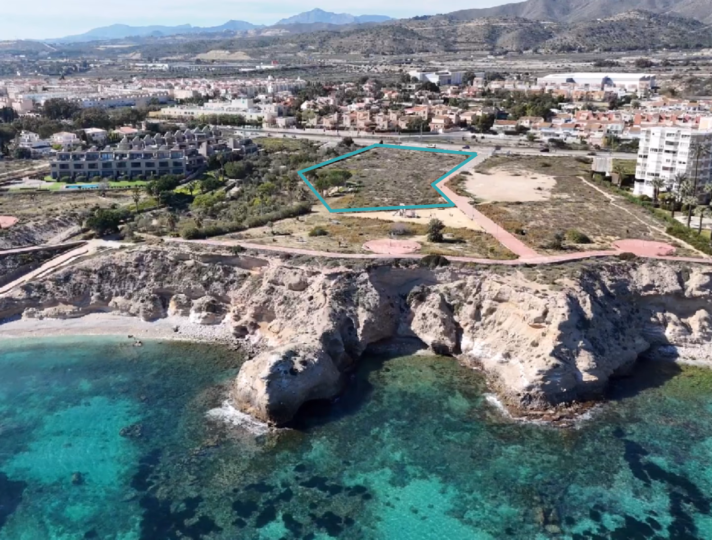 Crystal-clear water of the Amerador cove beside NJOY SHORE