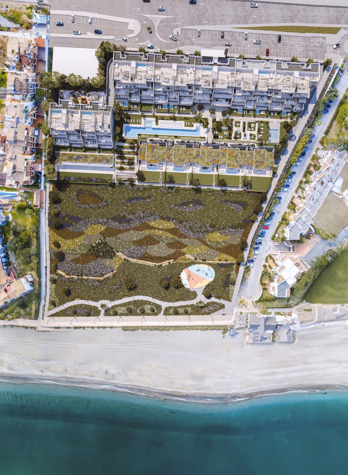 Aerial view of the complex between the coastal road and the beach