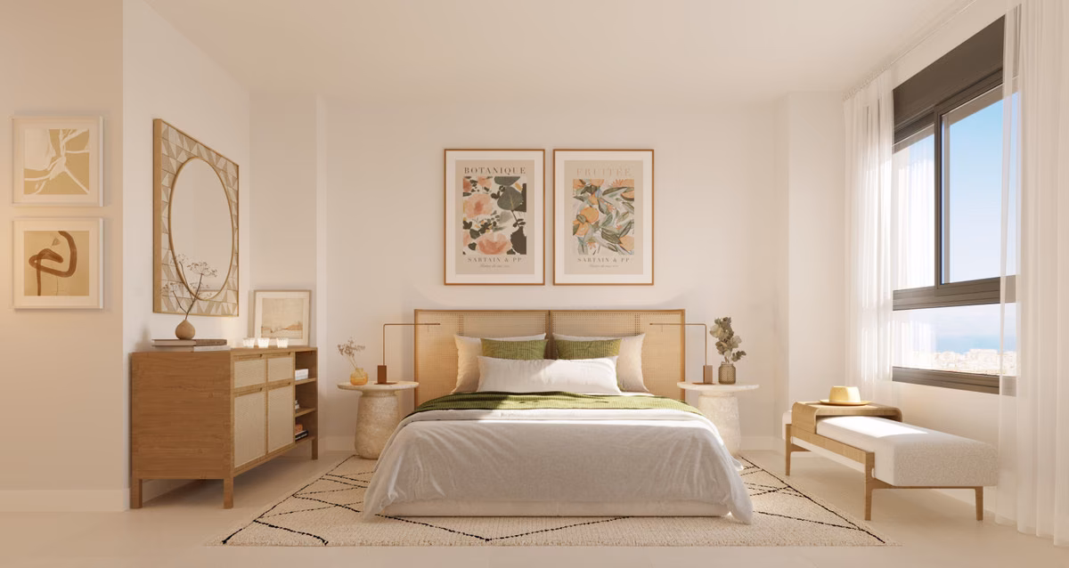Schlafzimmer mit Doppelbett und großem Fenster in einer Wohnung von One Oak