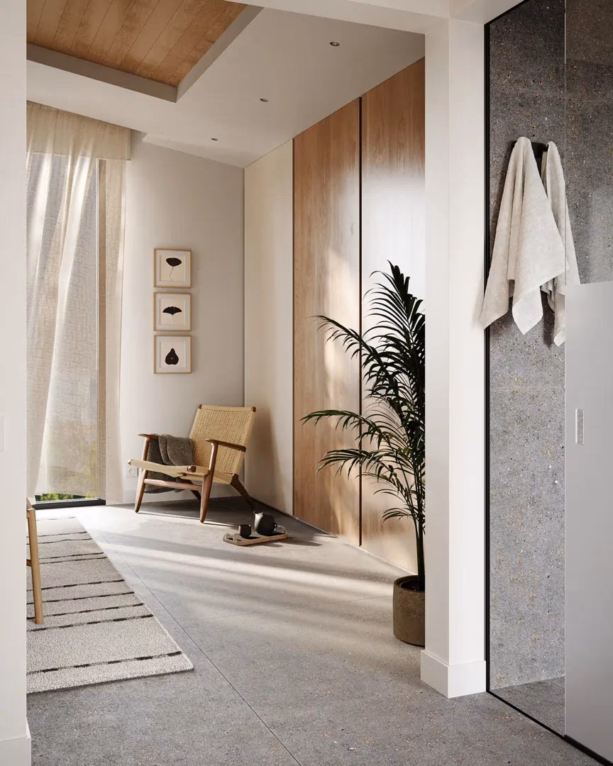 Bedroom corner with armchair and built-in wardrobe at Pine Valley Villas