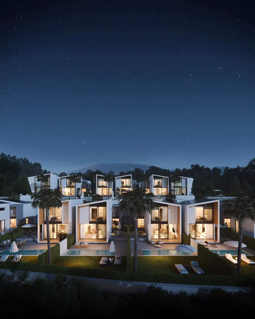 Pine Valley Villas homes lit up at night