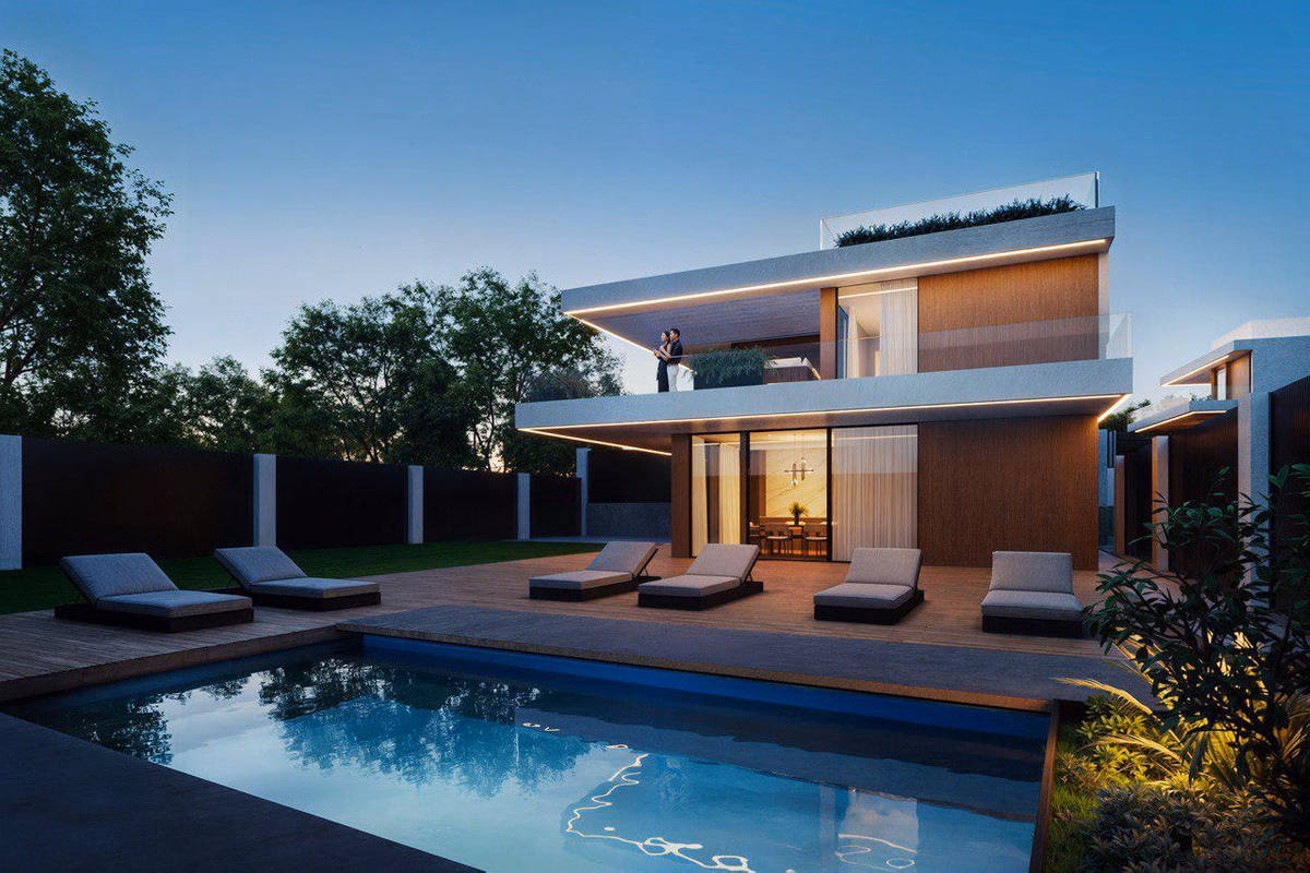 Die Villa und der Pool in der Abenddämmerung