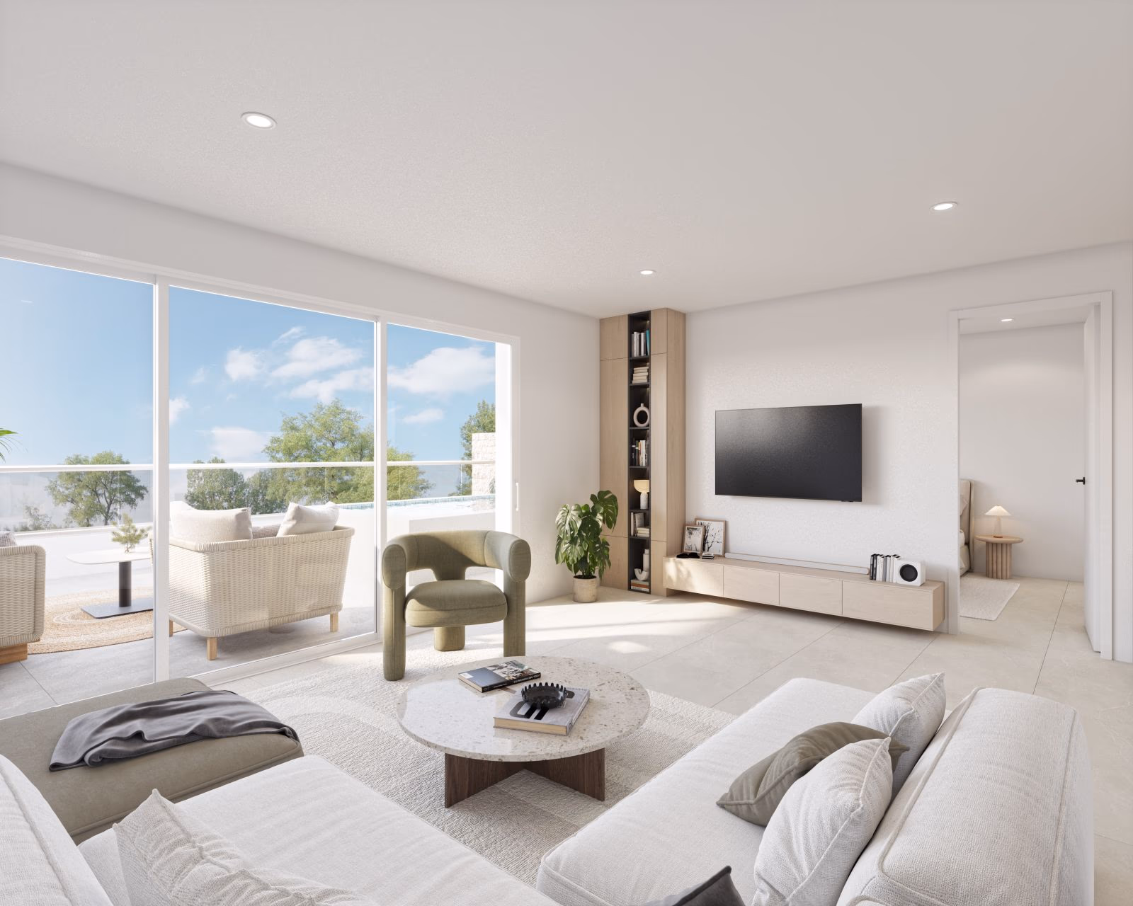 Bright lounge overlooking the private terrace and pool