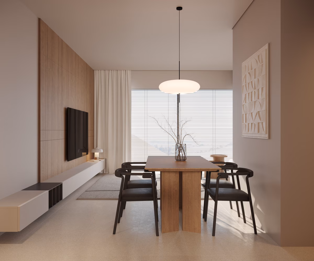 Rincón de comedor con mesa de madera oscura y pared revestida
