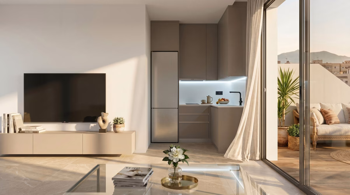 Open-plan living room with fitted kitchen and sliding door to the terrace