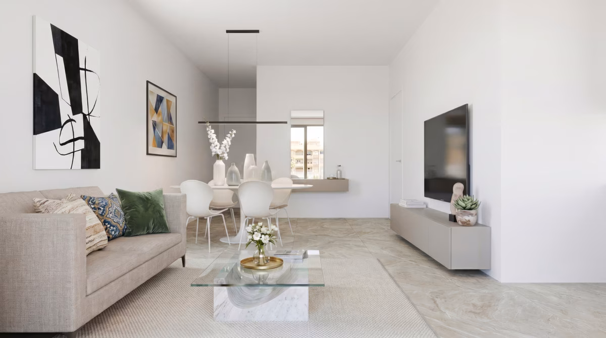 Living room with white sofa, dining table and TV wall