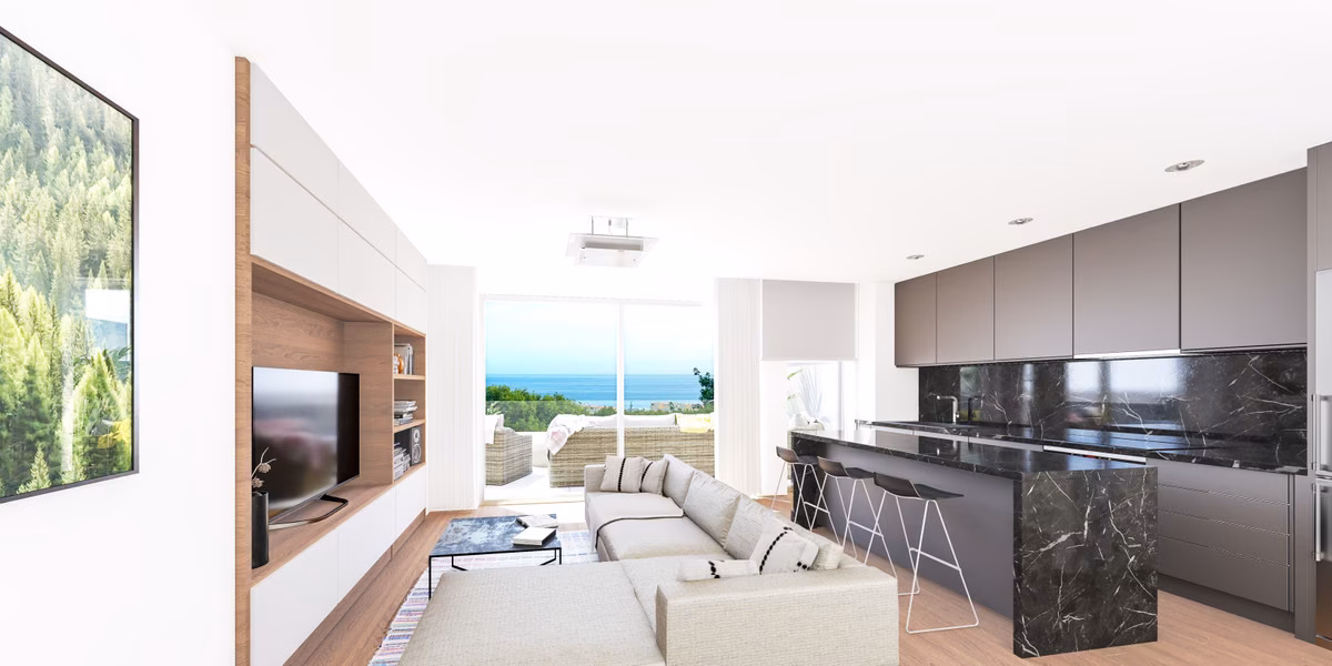 Living room and kitchen with sea views in a Residencial Pacaraima home