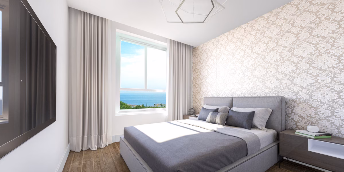 Bedroom with a sea view in a Residencial Pacaraima home