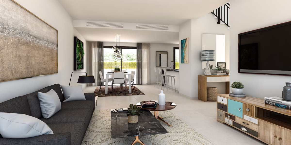 Wohnzimmer mit Sofa, TV-Möbel und Essbereich dahinter
