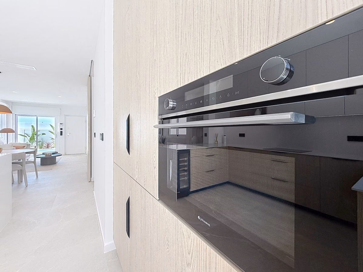 Close-up of the built-in oven in the oak units