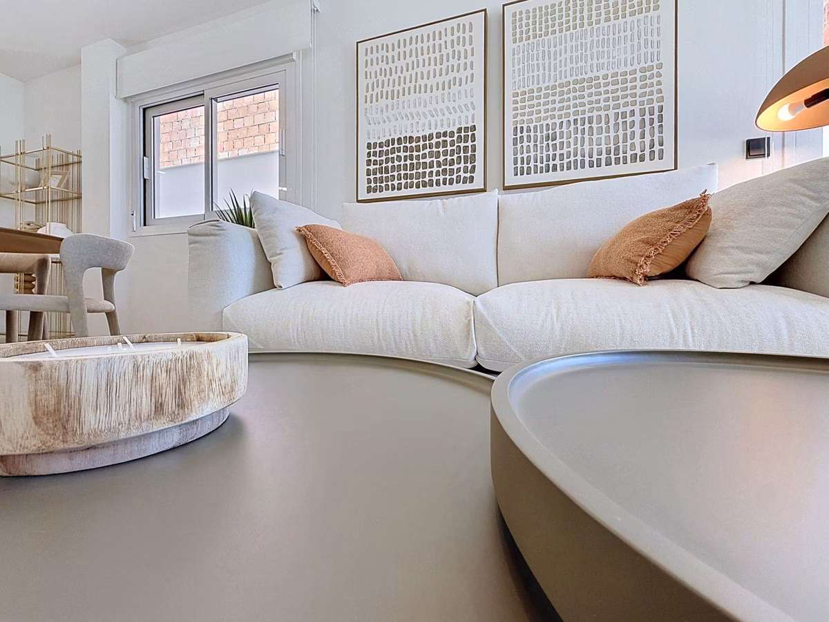 Sofa area with low round coffee tables