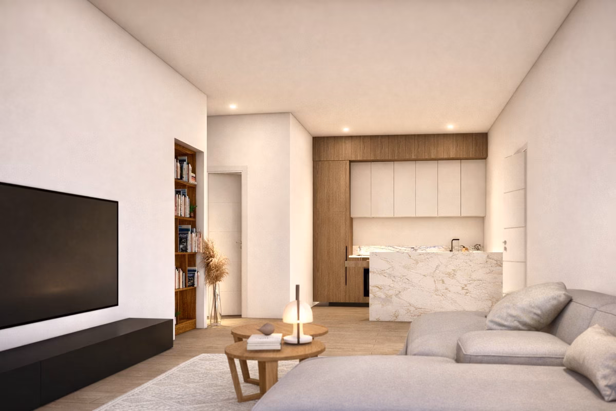Living room with TV unit and the kitchen at the back