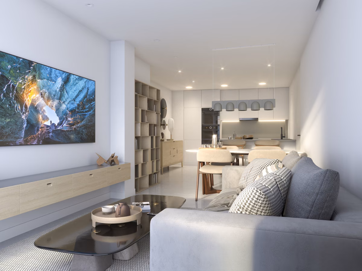 Wohnzimmer mit Sofa und Fernseher, dahinter die Küche, Wohnung in Santa Pola Elegance