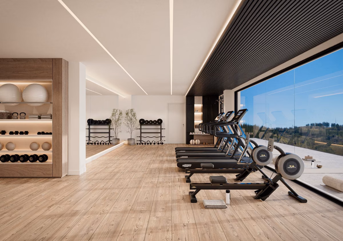 Fitnessraum mit Cardiogeräten und Glaswand, Soleil