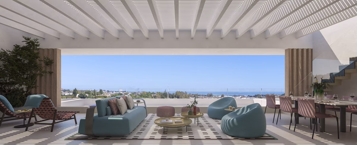 Salon d’extérieur sur la terrasse, la mer au loin