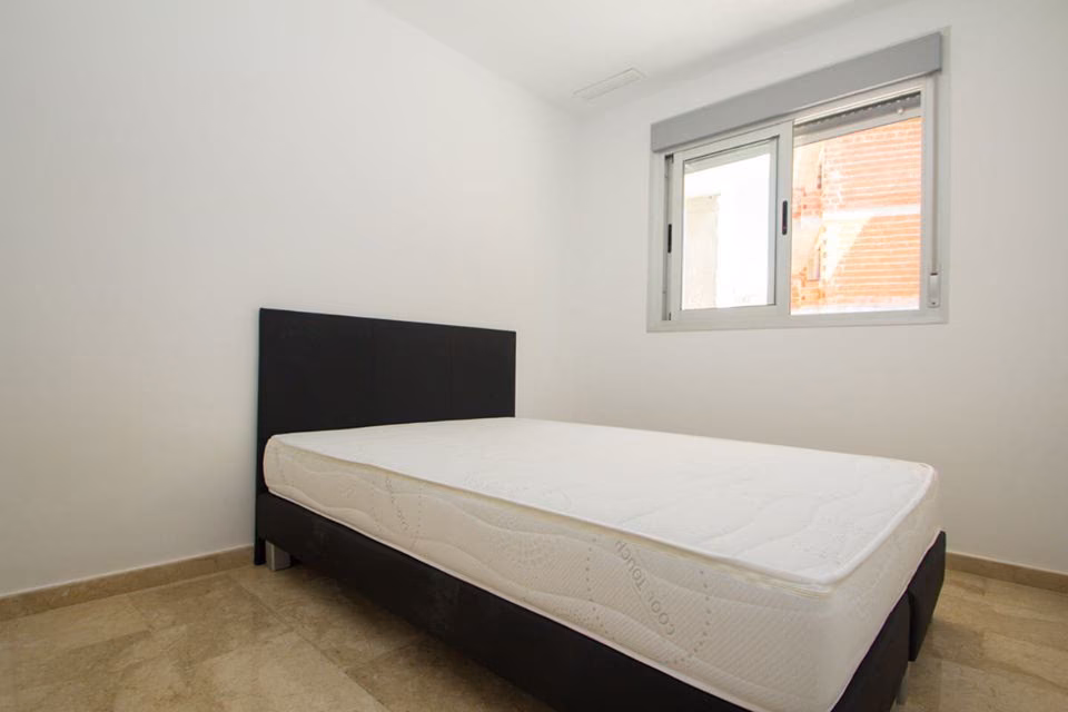 Bedroom with double bed and window