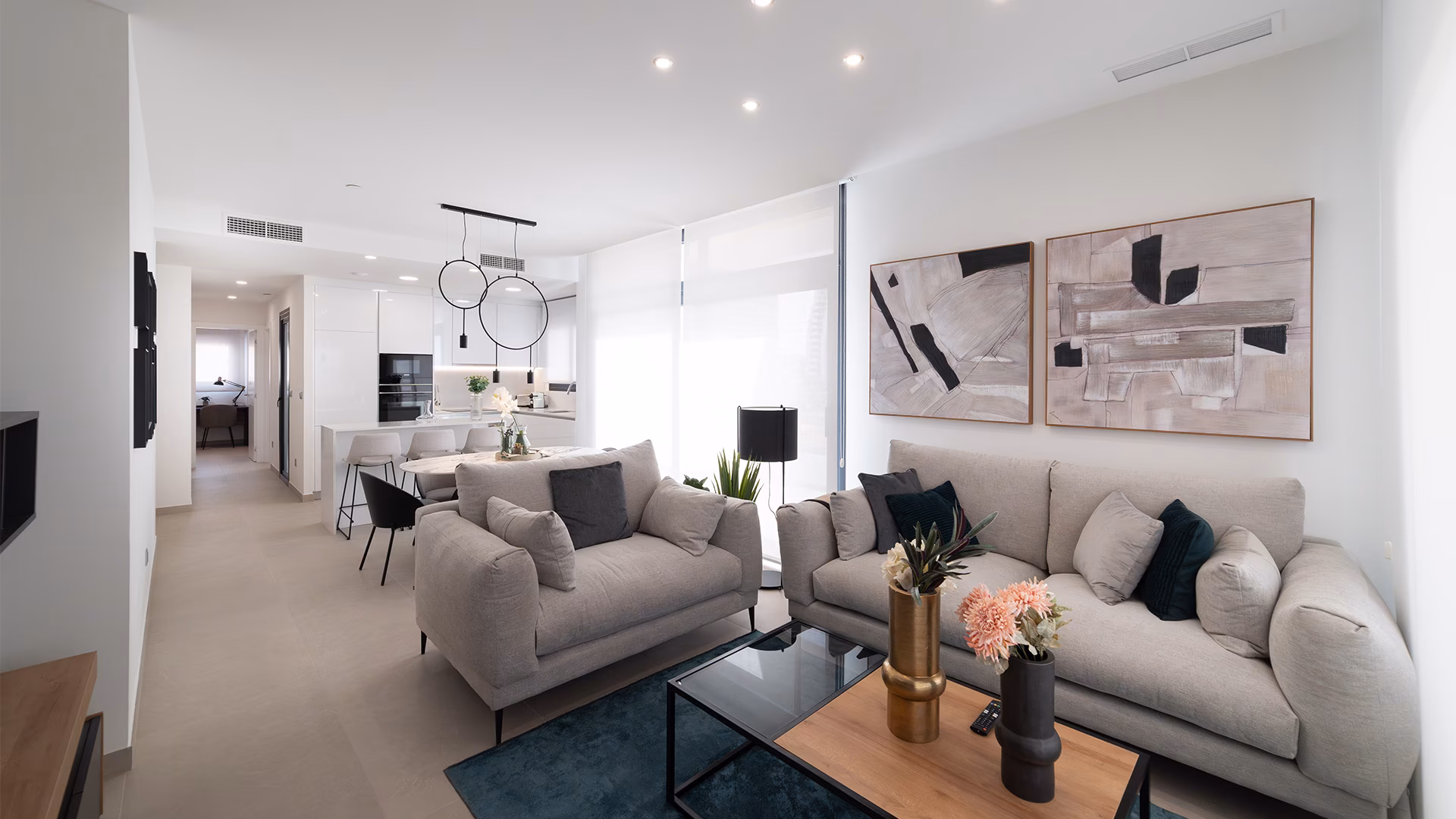 Living room with grey sofas and abstract artwork