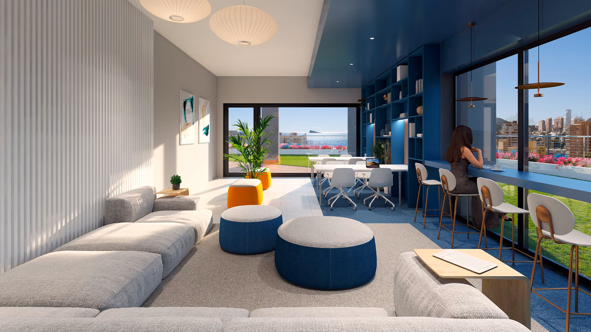 Coworking lounge with sofas and window desk seating