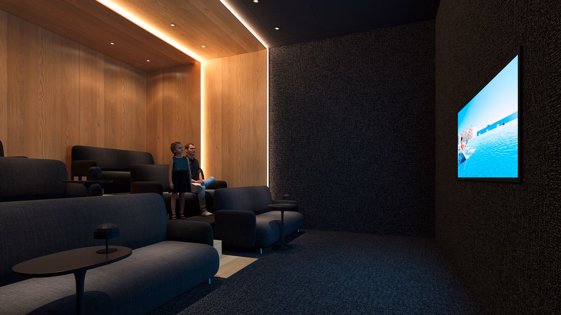 Residents’ cinema room with armchairs and a large screen