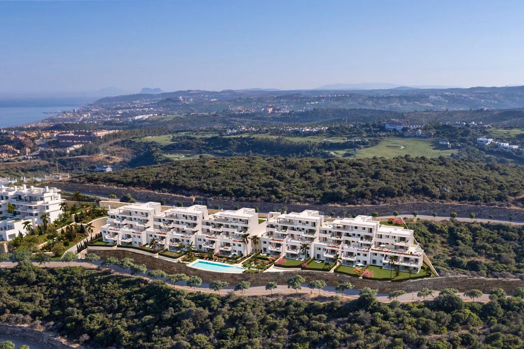Aerial view of the six blocks on the hillside above the golf course