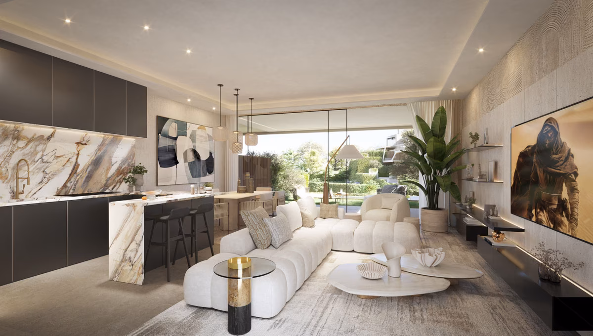 Open-plan kitchen and living room with marble island in a The Valley townhouse