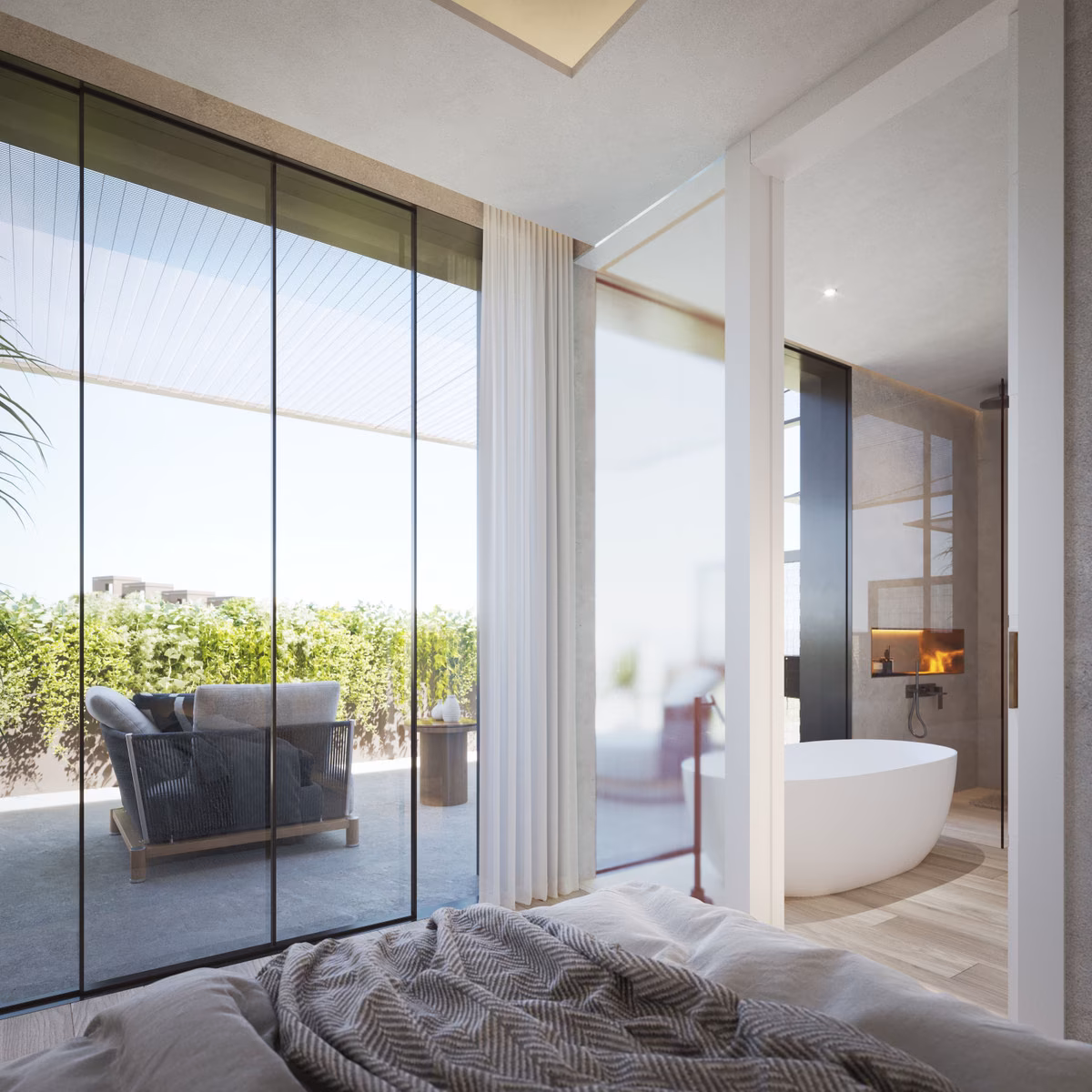 Bedroom with terrace doors and a freestanding bath beyond, The Valley