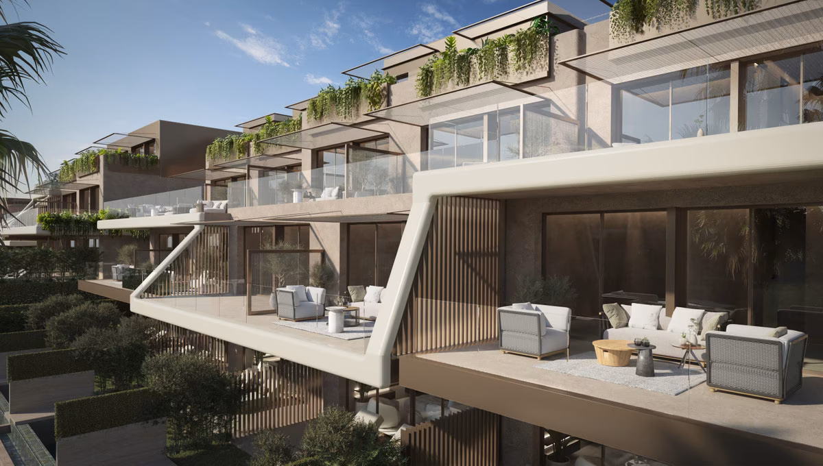 Covered upper-floor terraces with outdoor sofas at The Valley