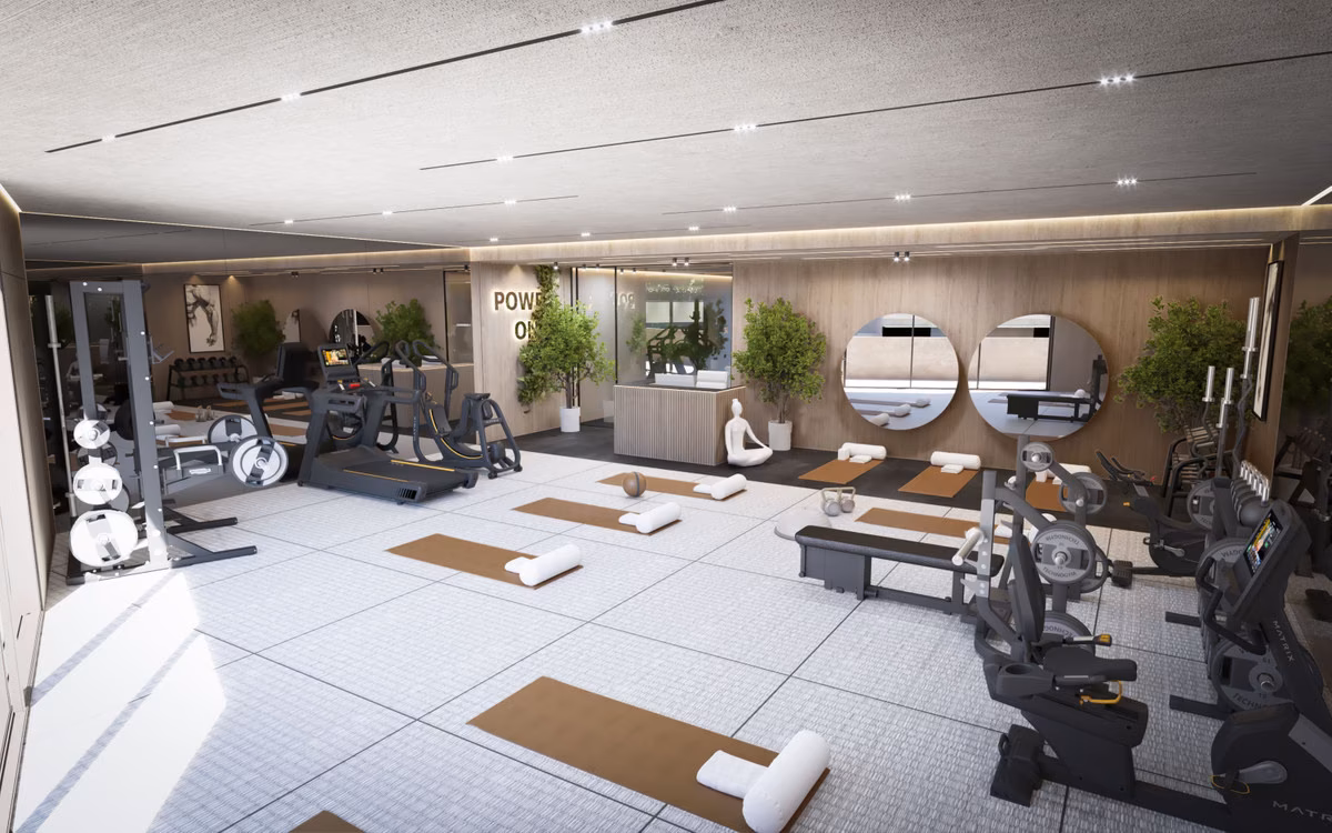 Gym with cardio machines and yoga mats at The Valley, Elviria