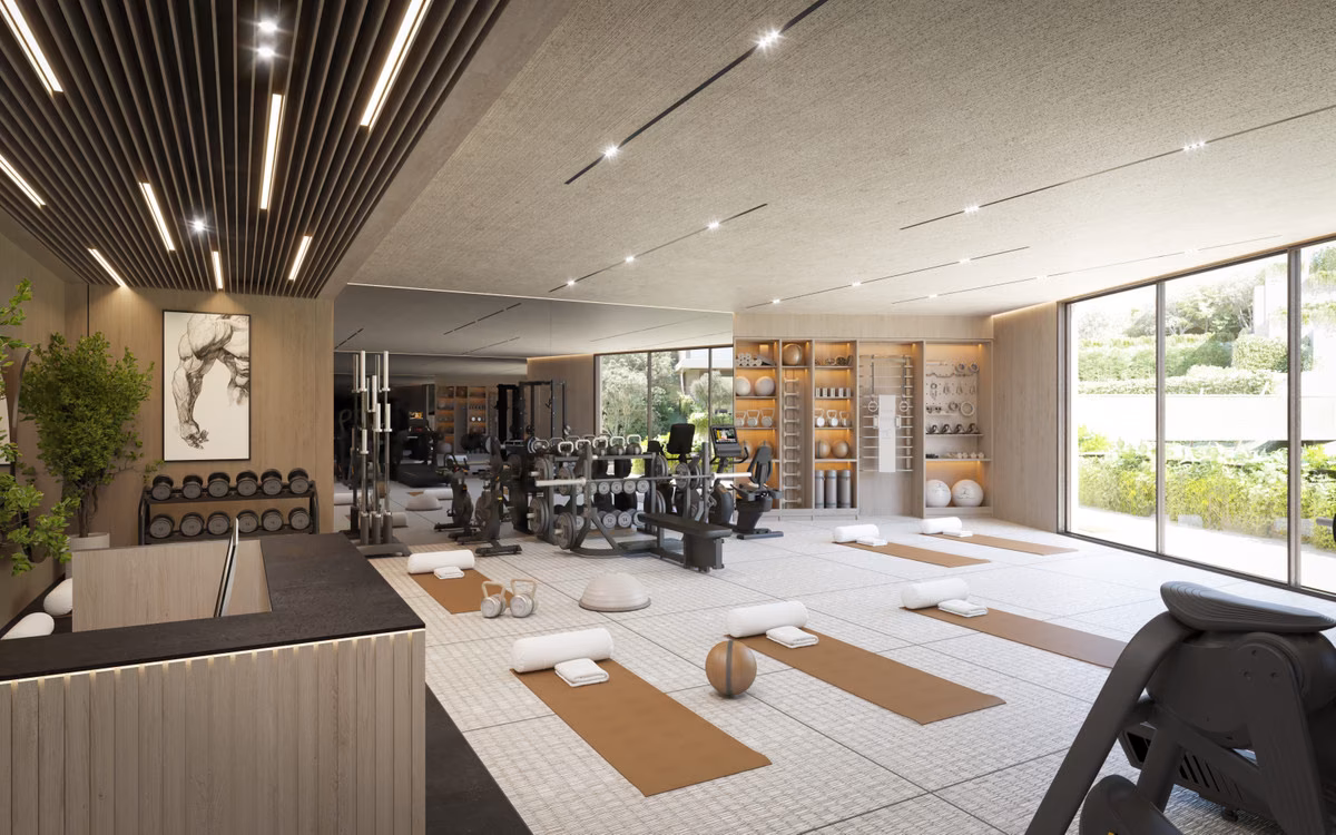 Gym and yoga studio with weights area at The Valley