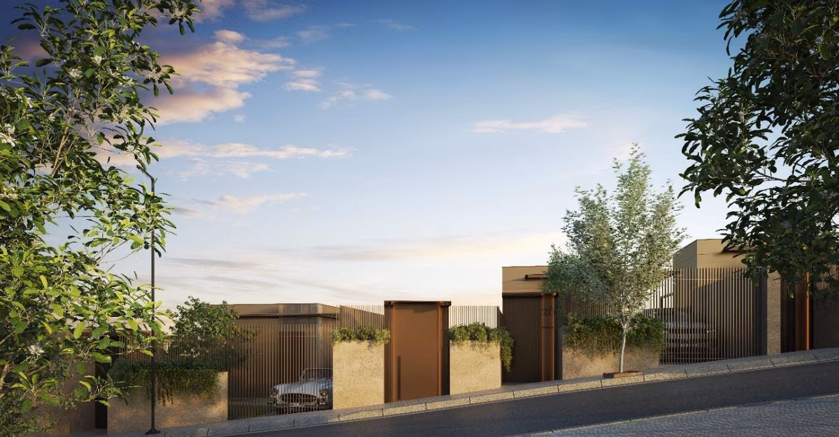 Street entrance with gates to the townhouses at The Valley, Elviria