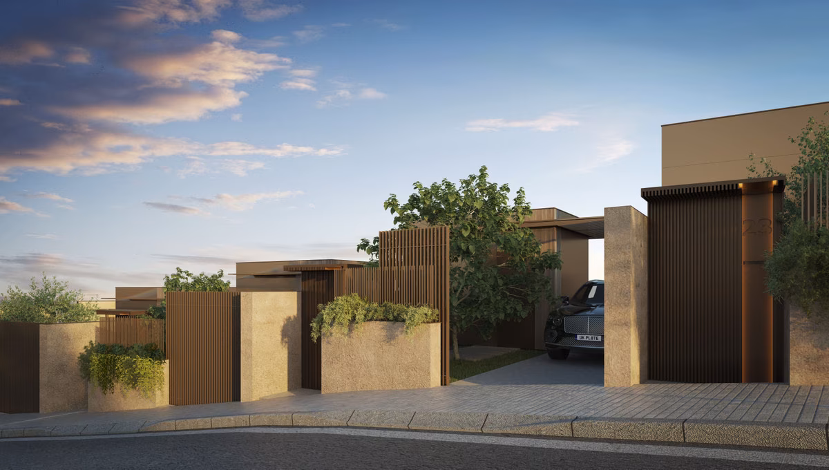 Townhouse entrances along the street at The Valley, Elviria