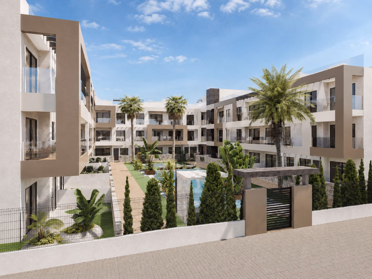 Gated garden courtyard with pool and apartment blocks