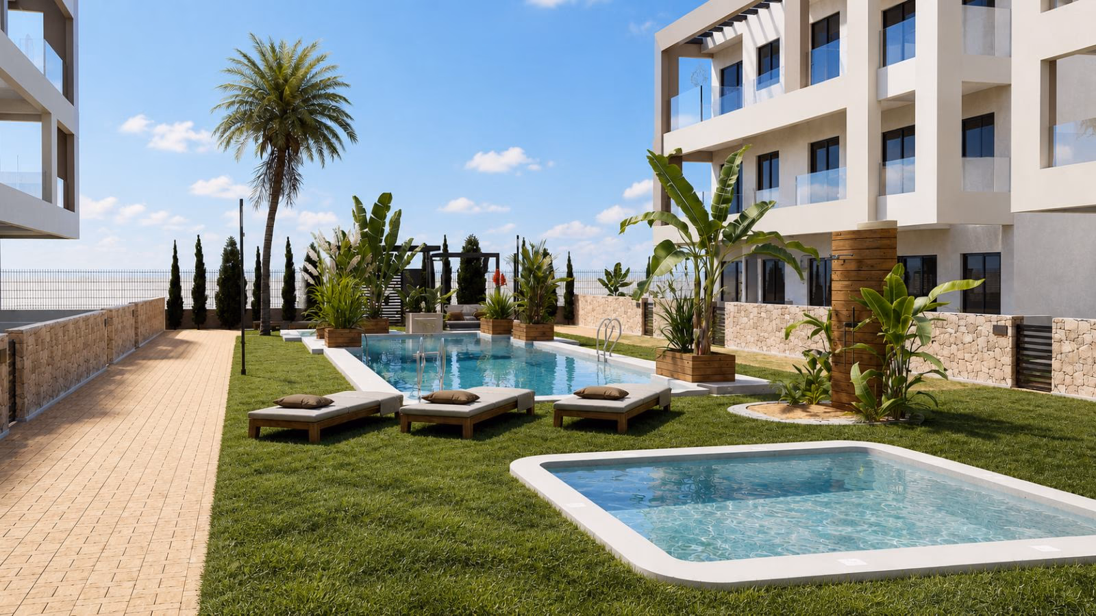 Pool and separate children's pool with sun loungers