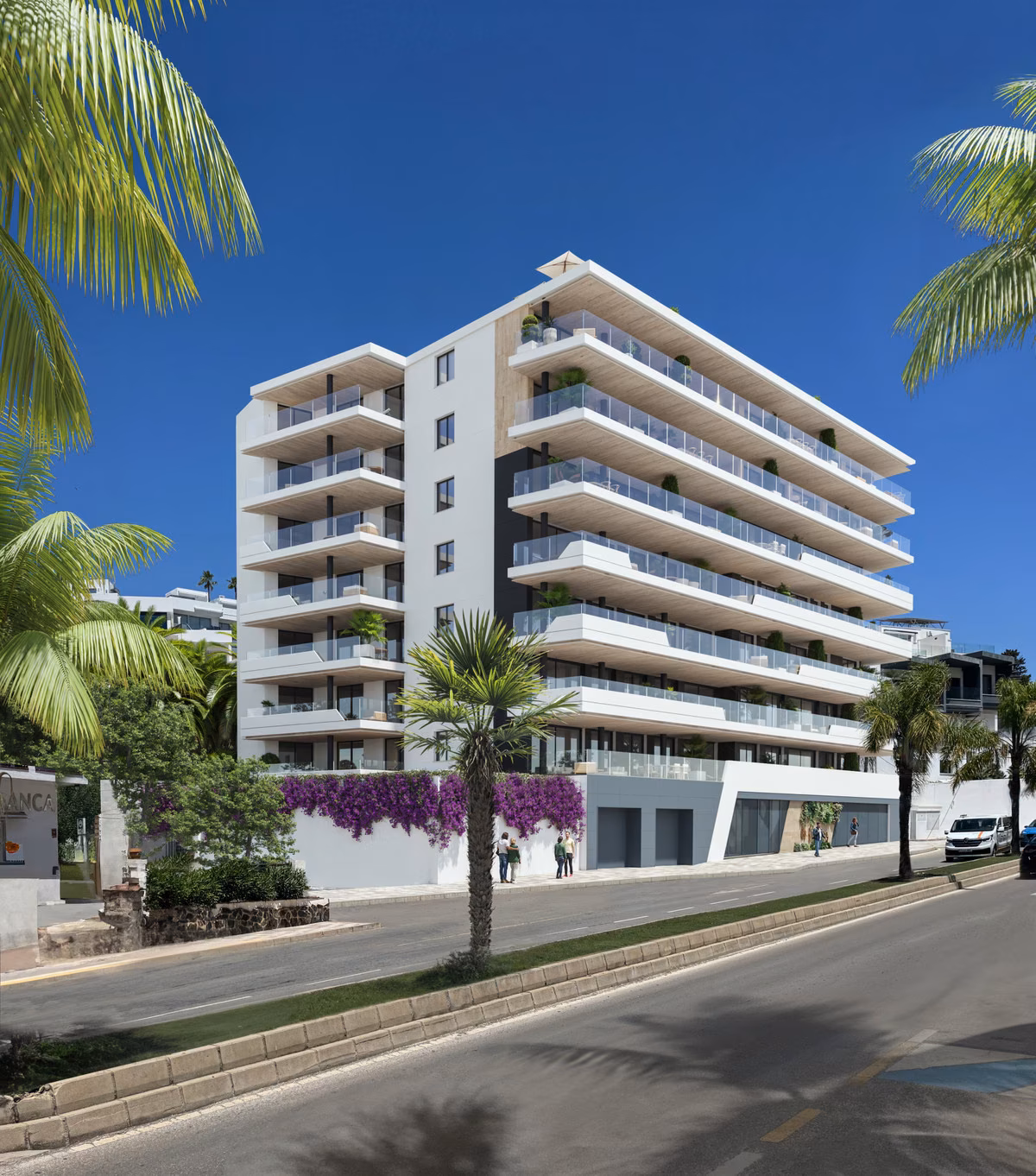 Torre Biznaga residential tower with palm trees in Carvajal, Fuengirola