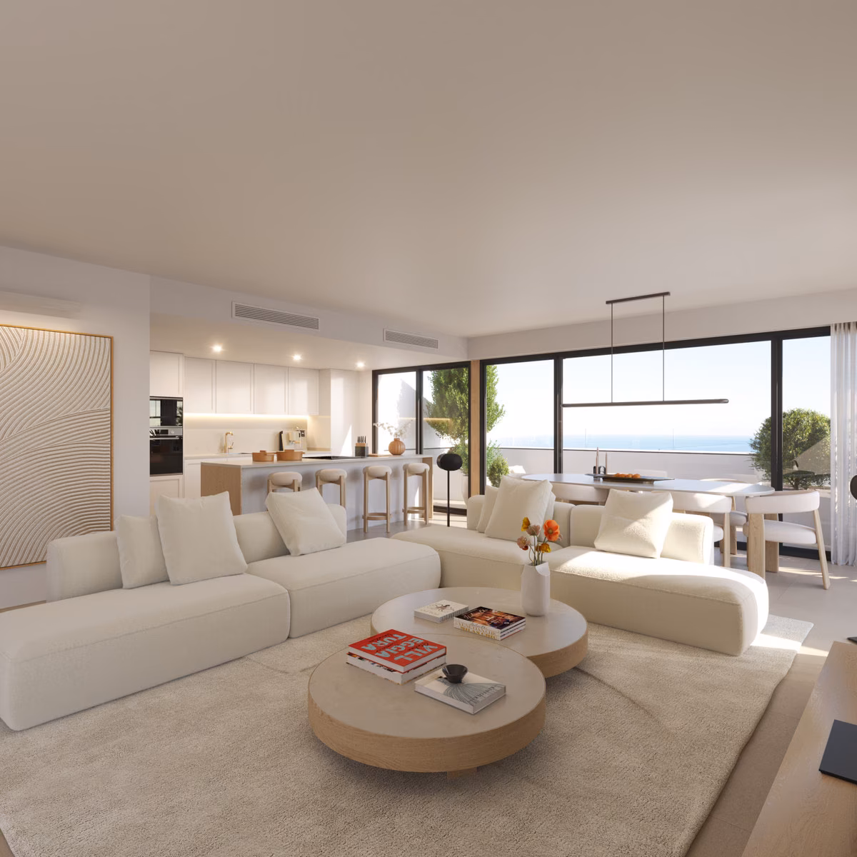 Living room with sofas and round coffee tables in a Torre Biznaga apartment