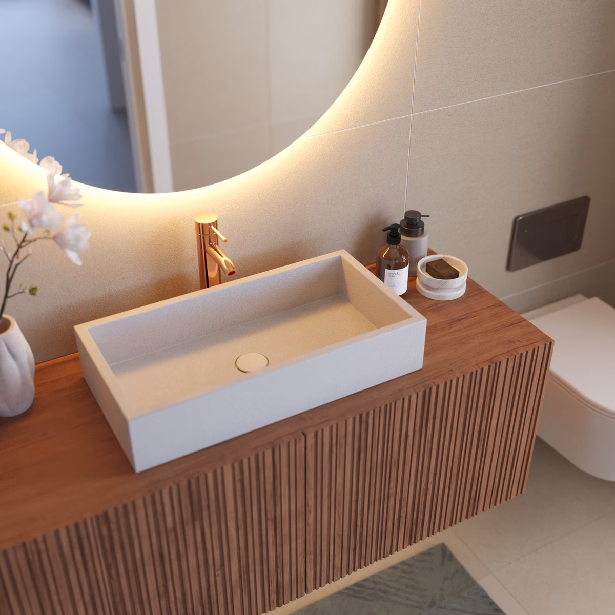 Washbasin on a ribbed wooden vanity at Torre Biznaga