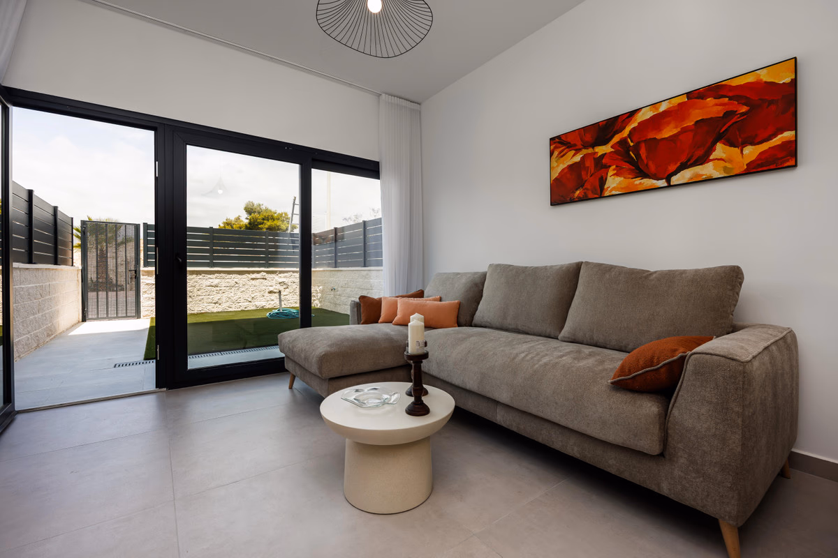 Open-plan living room opening to a private terrace at Moratella, Villajoyosa
