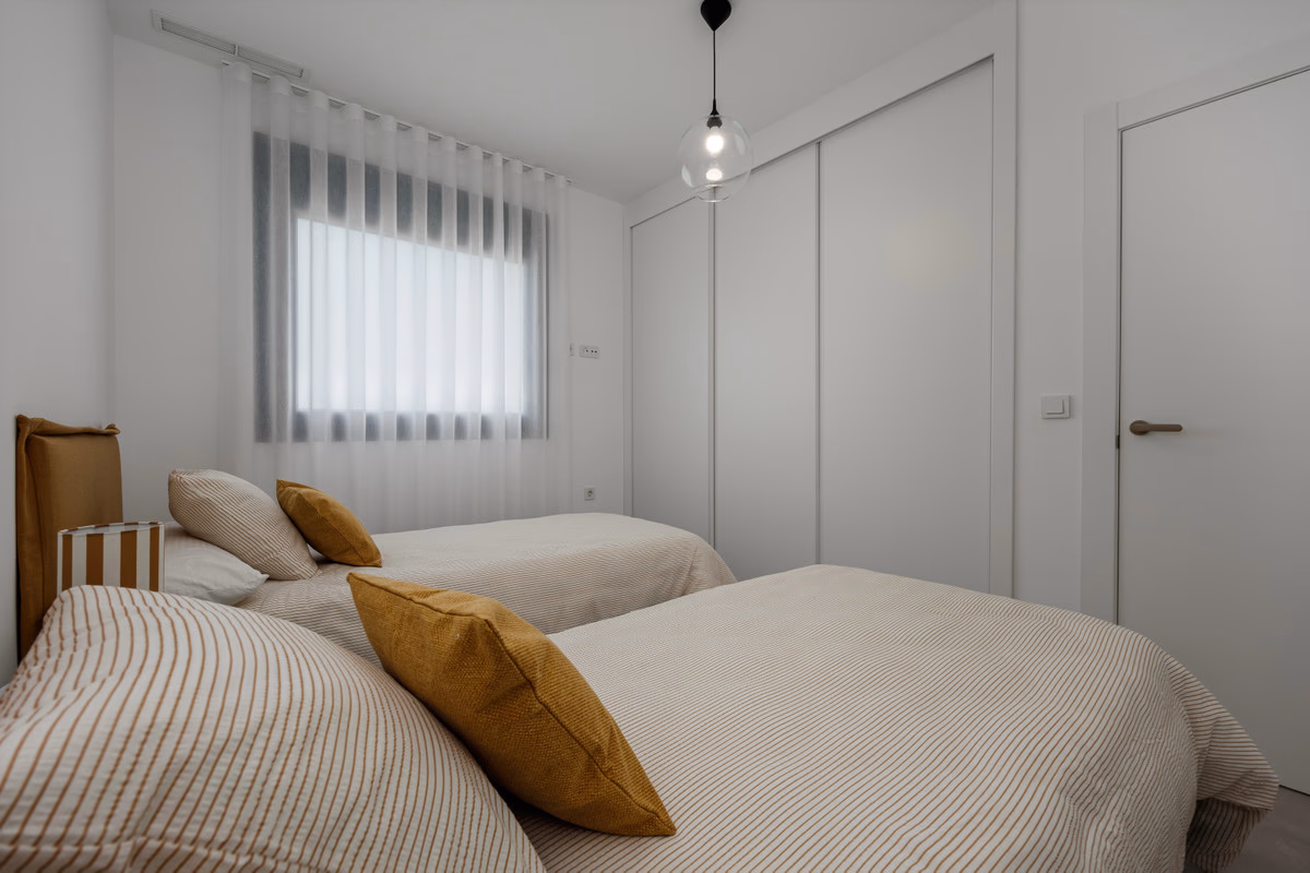 Twin bedroom in a Moratella tourist apartment, Villajoyosa