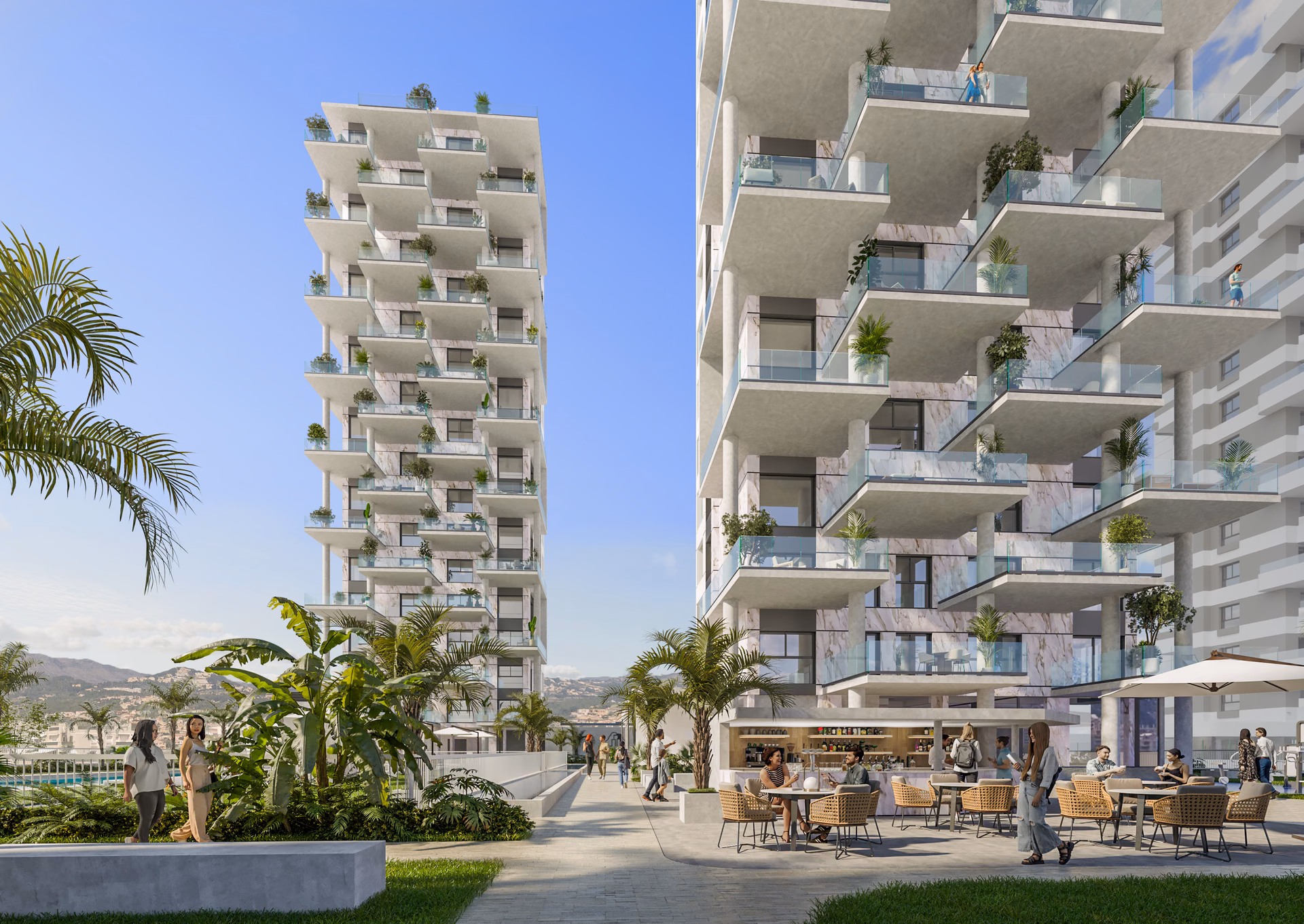 Deux des tours aux terrasses en gradins au-dessus du bar de piscine