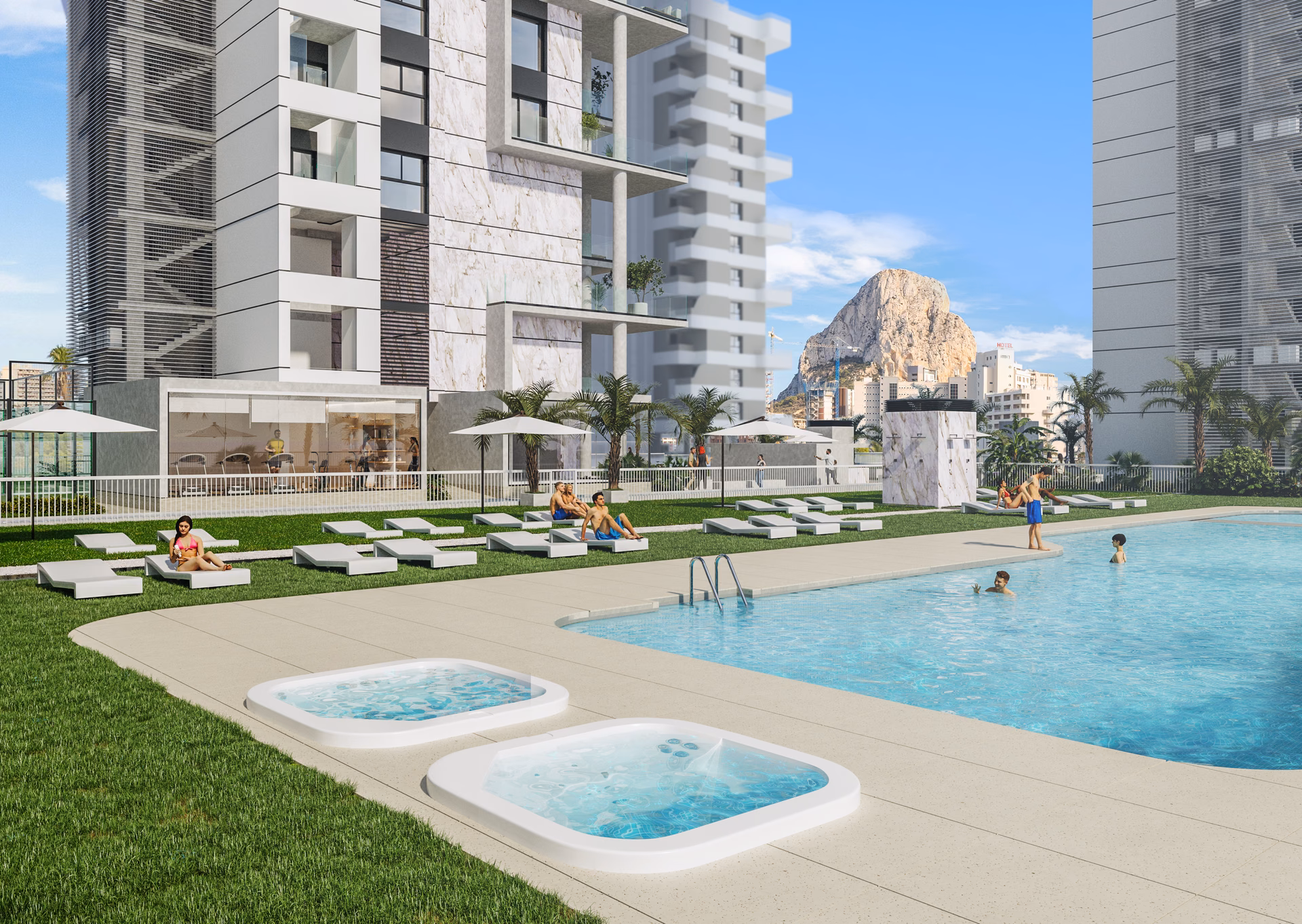 Piscine pour adultes avec deux jacuzzis et transats sur la pelouse