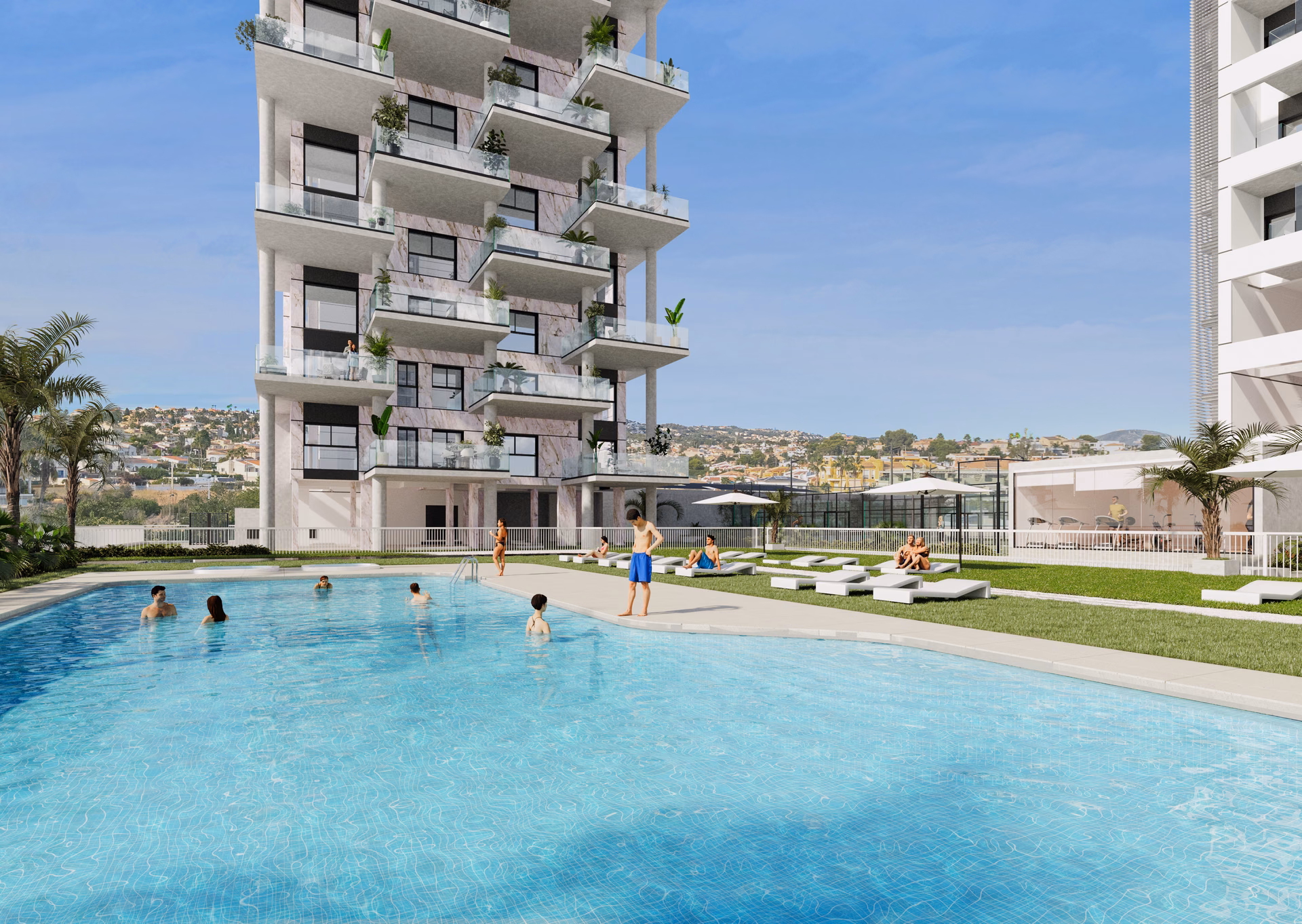 Piscine commune et jardin au pied d’une tour