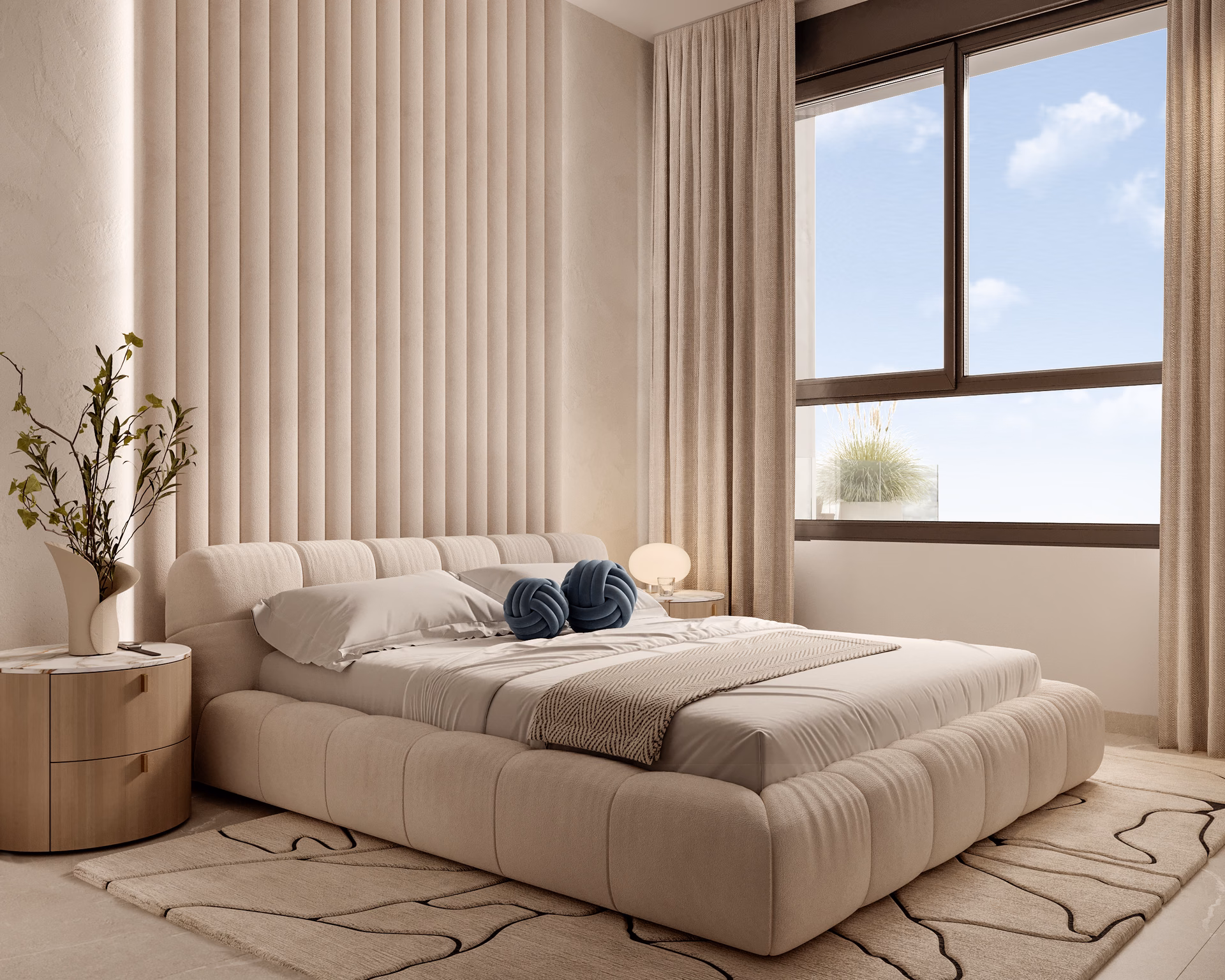 Chambre principale avec tête de lit capitonnée