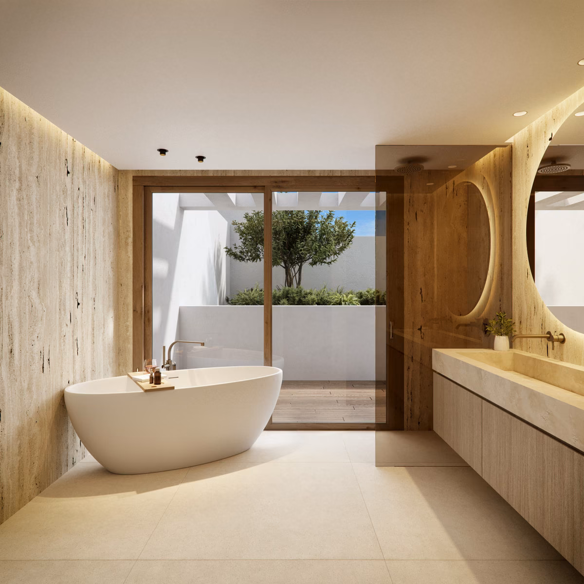 Bathroom with freestanding bath and garden view in a Verdana villa
