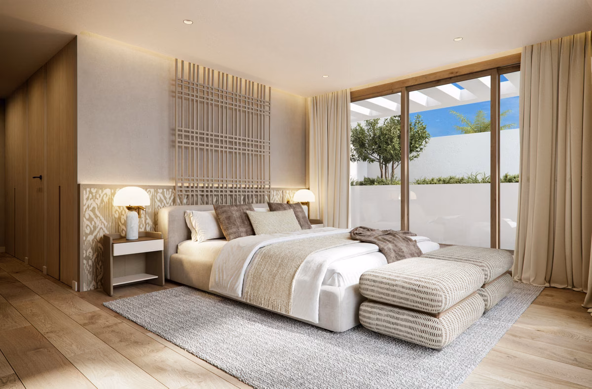 Bedroom with wooden floor and terrace access in a Verdana villa