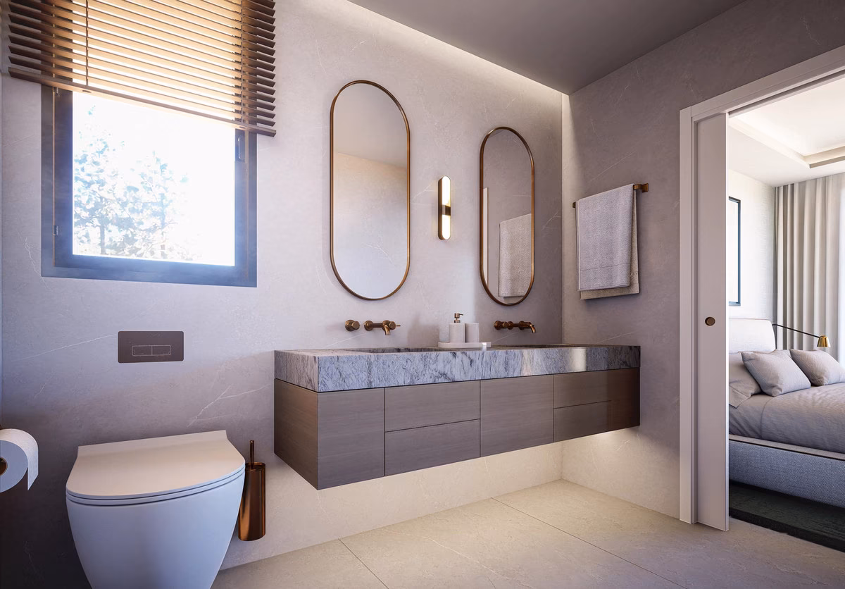 Baño con dos espejos ovalados
