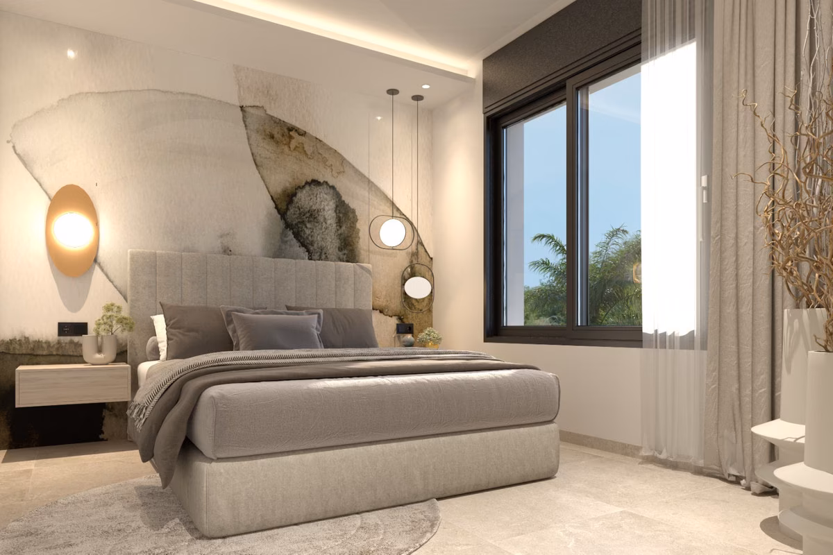 Schlafzimmer mit Akzentwand in Steinoptik und runder Wandleuchte, Villas Las Filipinas