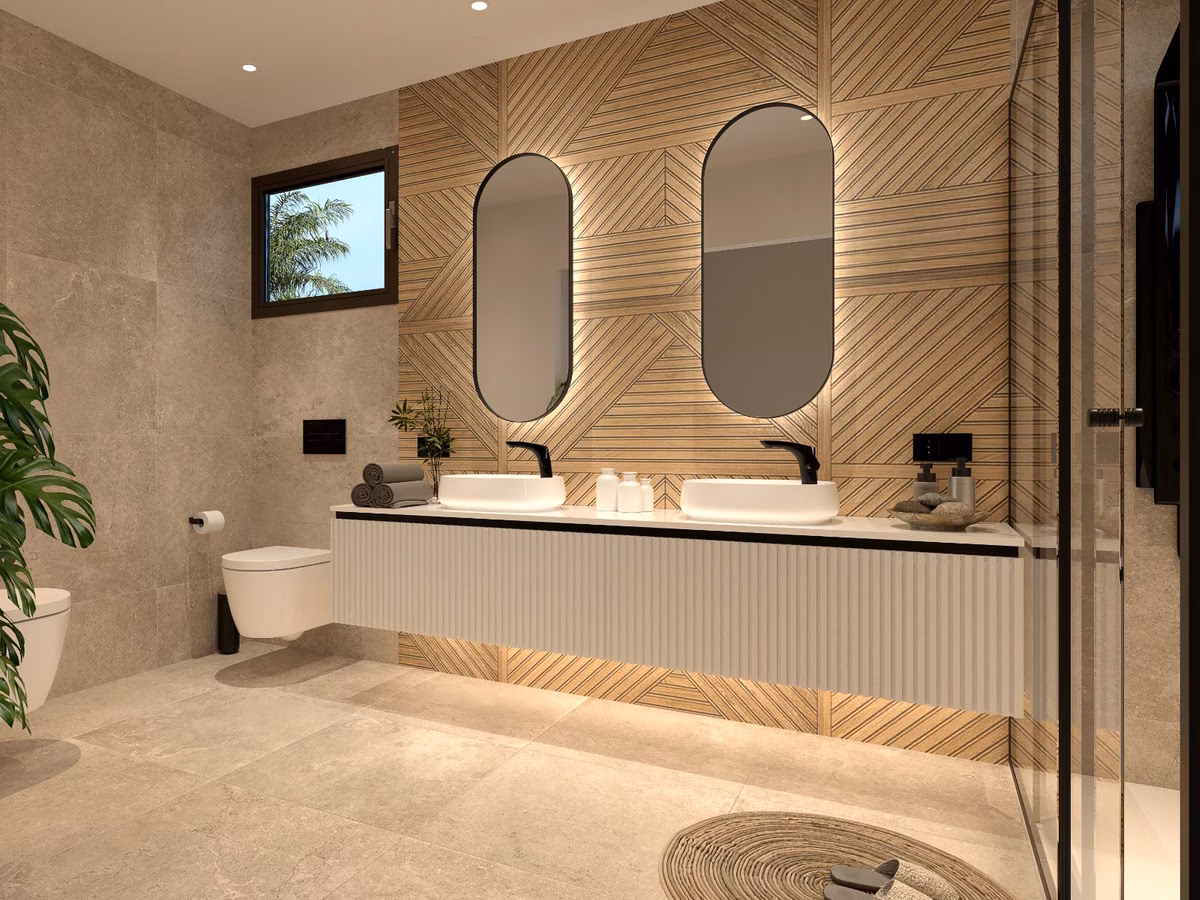 Bad mit Doppelwaschtisch und Wandfliesen in Holzoptik in einer Villa von Villas Las Filipinas